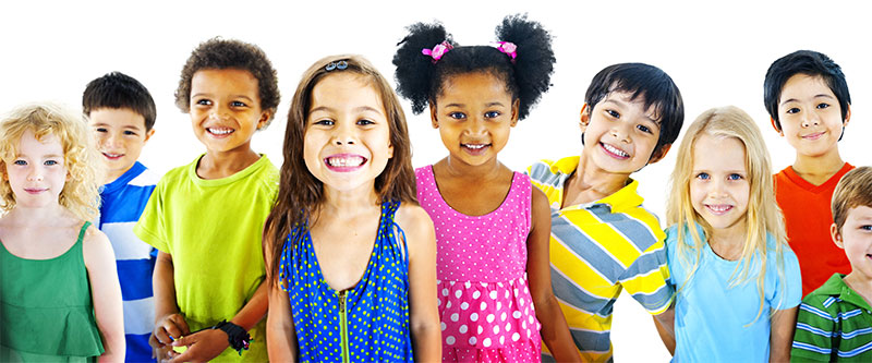 A group of diverse children smiling and posing together.